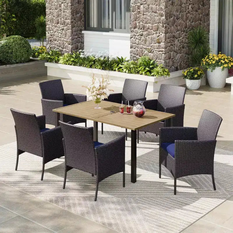 Captiva Designs 7pc Patio Slatted Top Steel Dining Table with Umbrella Hole & Cushioned Armrest Rattan Chairs