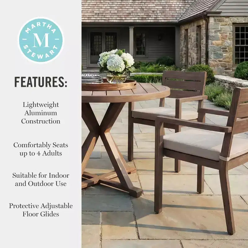 Martha Stewart Bedford 5 Piece Aluminum Patio Set, 4 Stackable Dining Armchairs with Cushions, 36 Round Trestle Base Table, Brushed Woodgrain Finish