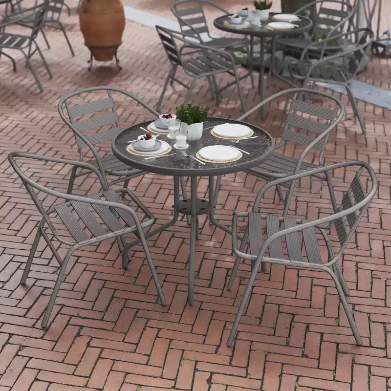 Flash Furniture Lila 31.5'' Round Glass Metal Table with 4 Metal Aluminum Slat Stack Chairs