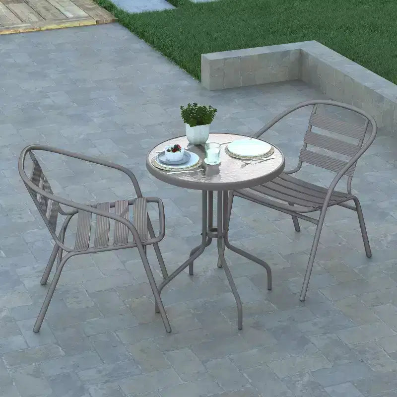 Emma and Oliver 23.75'' Round Glass Top Metal Table with 2 Aluminum Slat Stack Chairs