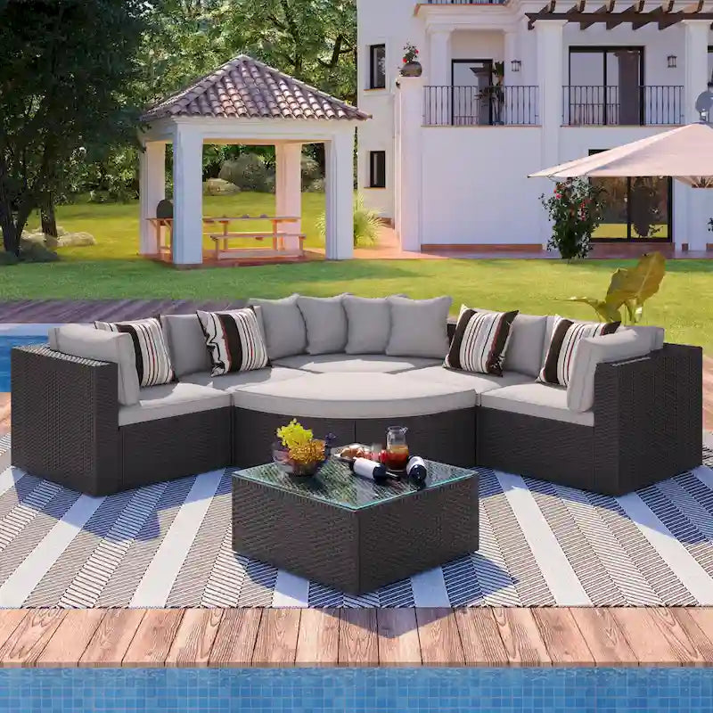 Ensemble de canapé d'extérieur moderne en osier 7 pièces avec table basse, coussins et oreillers rayés, idéal pour le patio, le jardin, la terrasse